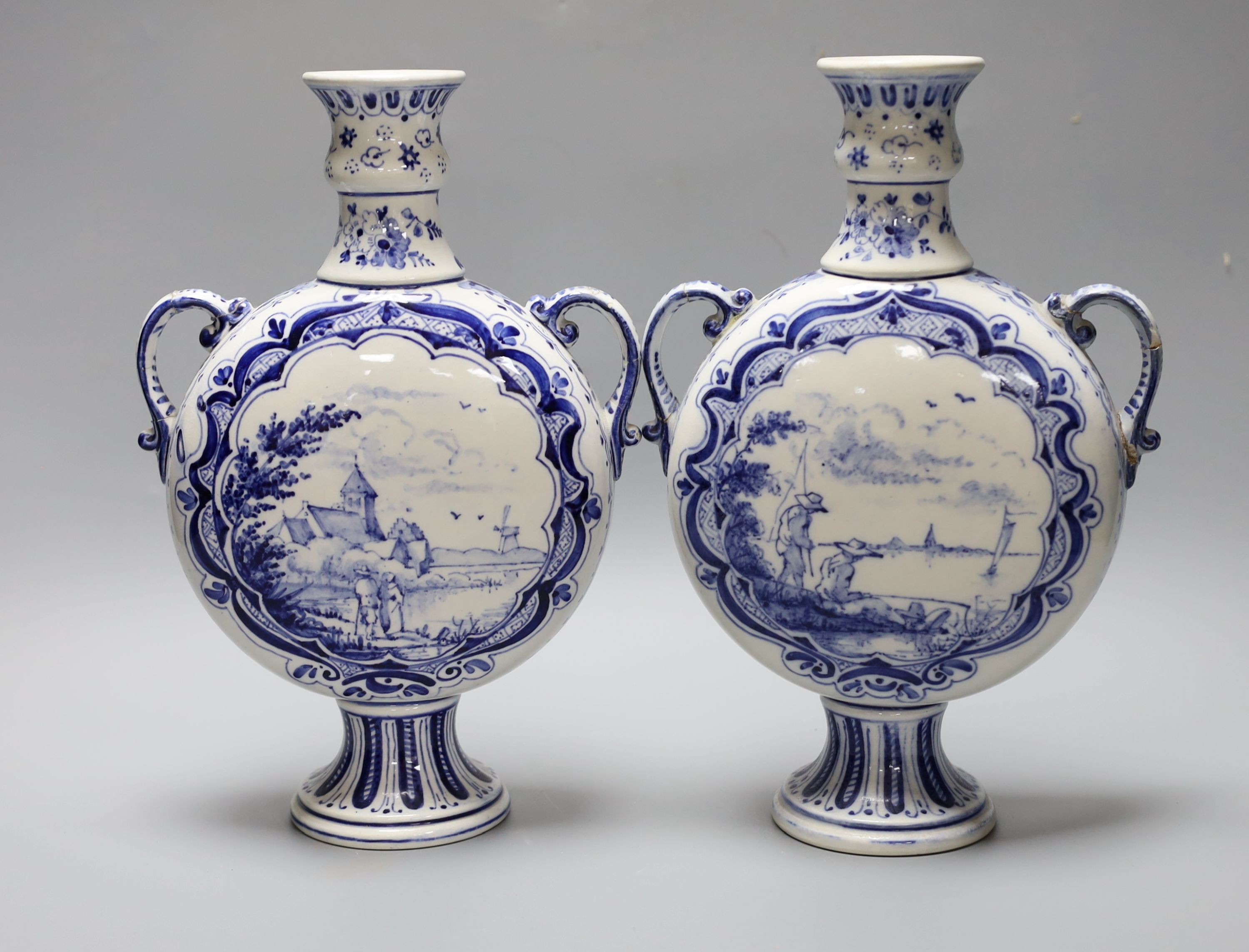 A pair of 19th century Delft vases 26cm